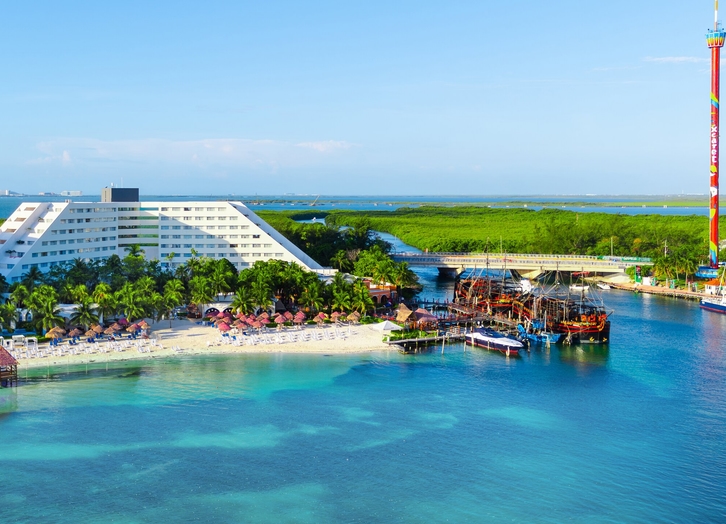 Aerial view of Grand Oasis Palm hotel with the pirate ships and the beach by the lagoon